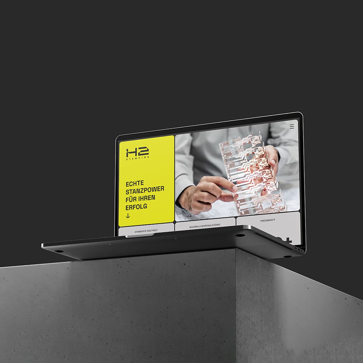 Laptop mit der H2Stamping-Website in moderner Ansicht