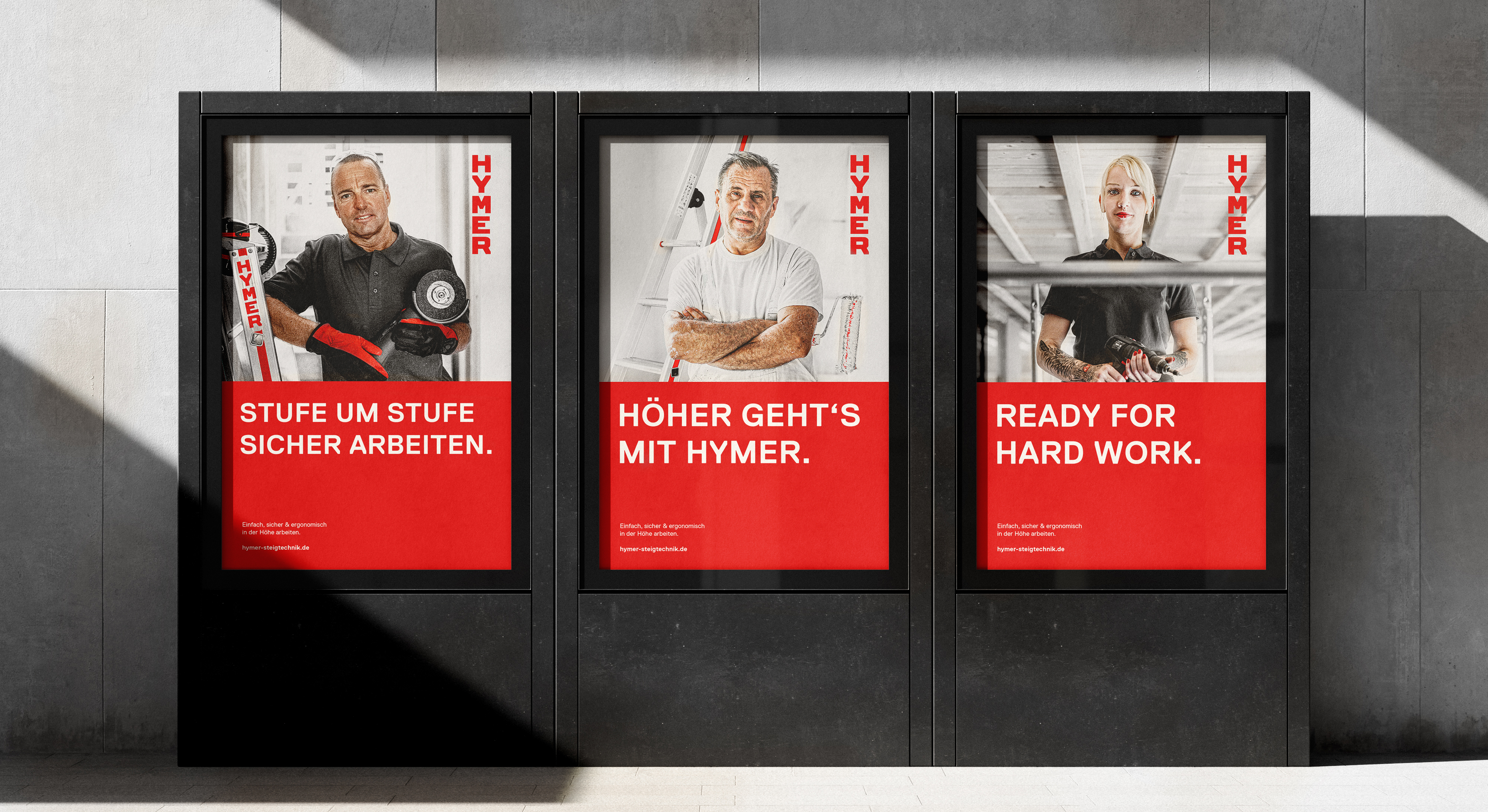 Markenpräsenz auf den Punkt: Drei Hymer-Poster stilvoll inszeniert.